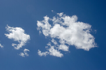 White clouds on a blue sky. Background.