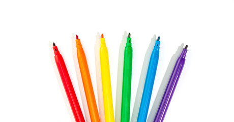 Fototapeta premium Markers of rainbow colors isolated on white background