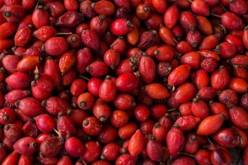 Dried red rosehip berries. Vitamin C. Background from berries.