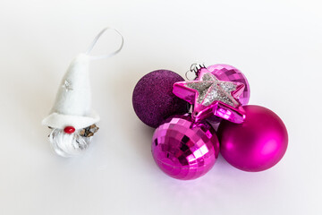 Christmas decorations. purple balls and gnome