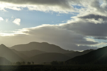 Layered hills and clouds in a vista in the Free State of South Africa