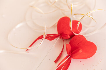 lovers' day. Valentine's Day. two red hearts on a white isolated background