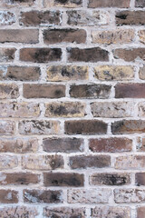 Background of wide old brick wall texture. Home or office design backdrop. Close-up texture. 
