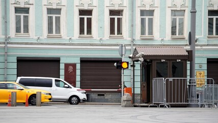 car in front of old building in city center of Moscow