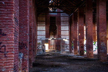Warehouse interior with large red brick walls
