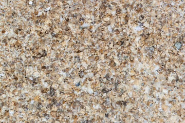 Sea ocean stone closeup macro  texture pattern with tiny different sizes broken pebbles above view