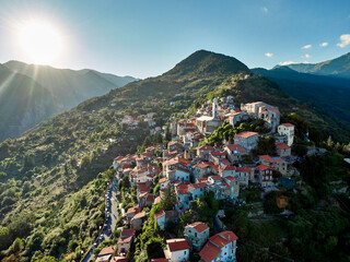 An aerial view at sunset of the town of Triora in Liguria, Italy.