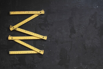 Yellow Measuring tape for tool roulette or ruler. Tape measure template in centimeters. Tapes meter set isolated on black background.