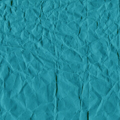 Obraz premium Blue vintage and old looking crumpled paper background. Retro cardboard texture. Grunge paper for drawing. Ancient book page. Present wrapping.