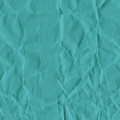 Blue vintage and old looking crumpled paper background. Retro cardboard texture. Grunge paper for drawing. Ancient book page. Present wrapping.