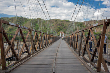 Obraz premium Santa Fe de Antioquia / Colombia - January 21, 2018. Puente de Occidente (Western Bridge) in Santa Fe de Antioquia, Colombia