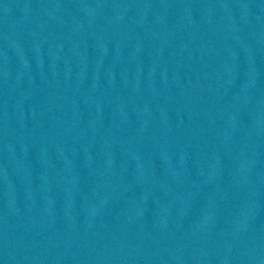 Blue vintage and old looking crumpled paper background. Retro cardboard texture. Grunge paper for drawing. Ancient book page. Present wrapping.