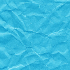 Blue vintage and old looking crumpled paper background. Retro cardboard texture. Grunge paper for drawing. Ancient book page. Present wrapping.