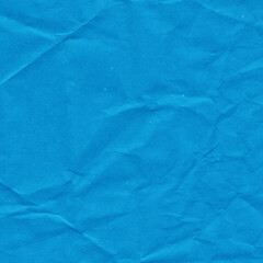 Blue vintage and old looking crumpled paper background. Retro cardboard texture. Grunge paper for drawing. Ancient book page. Present wrapping.