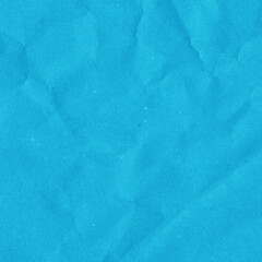 Blue vintage and old looking crumpled paper background. Retro cardboard texture. Grunge paper for drawing. Ancient book page. Present wrapping.