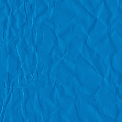 Blue vintage and old looking crumpled paper background. Retro cardboard texture. Grunge paper for drawing. Ancient book page. Present wrapping.