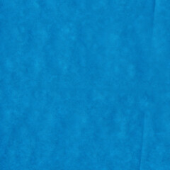 Blue vintage and old looking crumpled paper background. Retro cardboard texture. Grunge paper for drawing. Ancient book page. Present wrapping.
