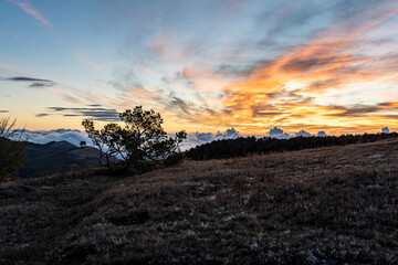 meeting the sunrise at the top of the mountain