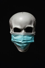 Doubtful Human Skull with Surgical Mask