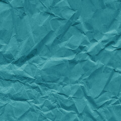 Blue vintage and old looking crumpled paper background. Retro cardboard texture. Grunge paper for drawing. Ancient book page. Present wrapping.