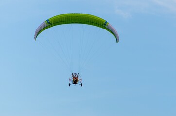 Paraglider flying free in the sky