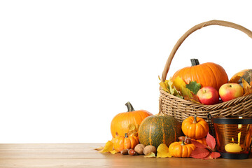 Composition with ripe pumpkins and autumn leaves on wooden table against white background. Happy Thanksgiving day