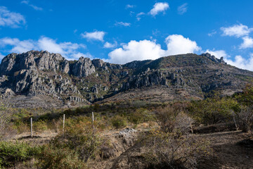 panorama of the unusual form of the mountains against the blue sky
