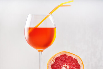 Alcohol Aperol drink with grapefruit in glass