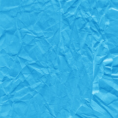 Obraz premium Blue vintage and old looking crumpled paper background. Retro cardboard texture. Grunge paper for drawing. Ancient book page. Present wrapping.