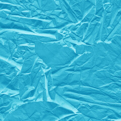 Obraz premium Blue vintage and old looking crumpled paper background. Retro cardboard texture. Grunge paper for drawing. Ancient book page. Present wrapping.