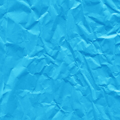 Blue vintage and old looking crumpled paper background. Retro cardboard texture. Grunge paper for drawing. Ancient book page. Present wrapping.