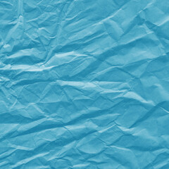 Obraz premium Blue vintage and old looking crumpled paper background. Retro cardboard texture. Grunge paper for drawing. Ancient book page. Present wrapping.