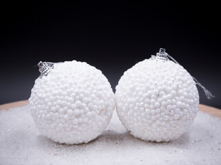 Christmas balls on a centerpiece with a black background