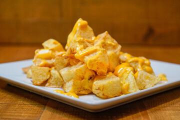 Ration of patatas bravas