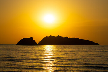 Naklejka na ściany i meble Beautiful sunset on one of greek islands