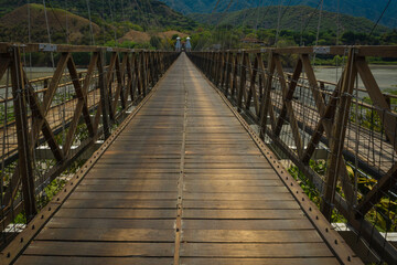 Obraz premium Santa Fe de Antioquia / Colombia - January 21, 2018. Puente de Occidente (Western Bridge) in Santa Fe de Antioquia, Colombia