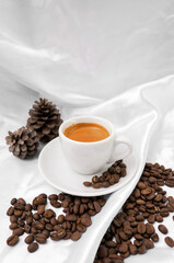 Espresso coffee and coffee beans on a white background