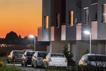 modern street with apartment building and led street lights