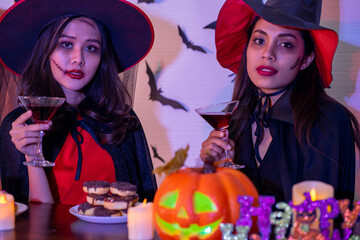 young Asian woman wearing costume in Halloween festival party