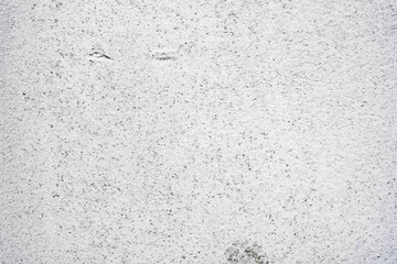 Texture of a concrete wall with cracks and scratches which can be used as a background