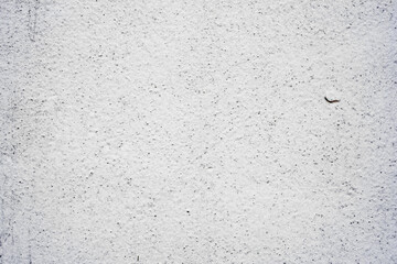 Texture of a concrete wall with cracks and scratches which can be used as a background