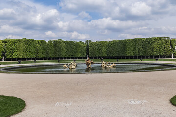 Detail of Dragon Fountain in Versailles palace - royal chateau, 20 km southwest of center of Paris....