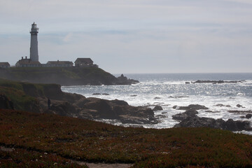 Fototapeta na wymiar Lighthouse on a rocky shore
