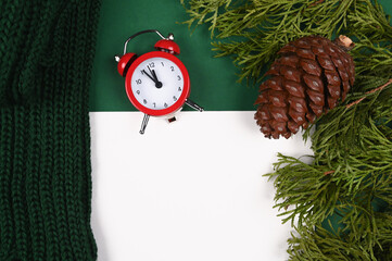 Red clock on a New Year's background