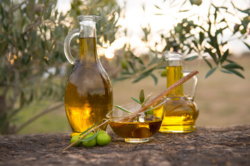 fresh olives and olive oil in their natural environment