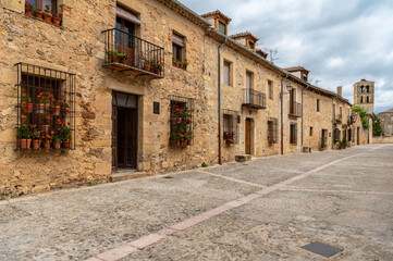 Fototapeta na wymiar Medieval streets of the town of Pedraza one of the most beautiful in Spain in the province of Segovia