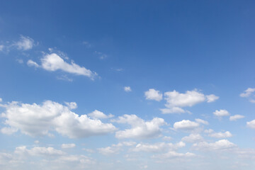 Naklejka na ściany i meble blue sky background with white clouds,copy space.