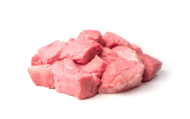 Fresh raw meat is cut into large chunks for frying. Grocery background.