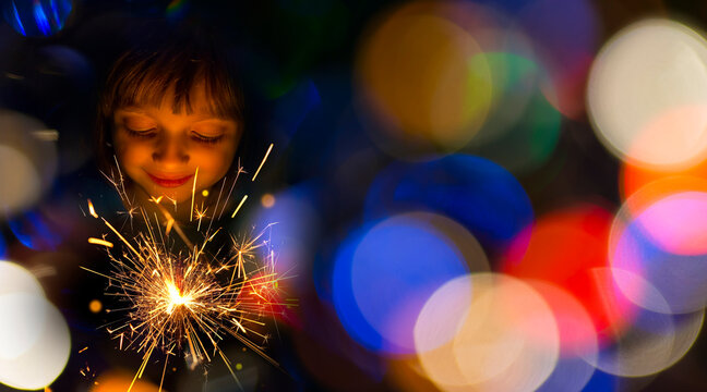 happy girl with a sparkler