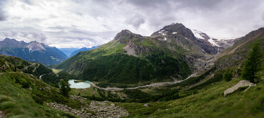 Naklejka na ściany i meble Panorama im Gebirge - Gletscher und Gebirgssee